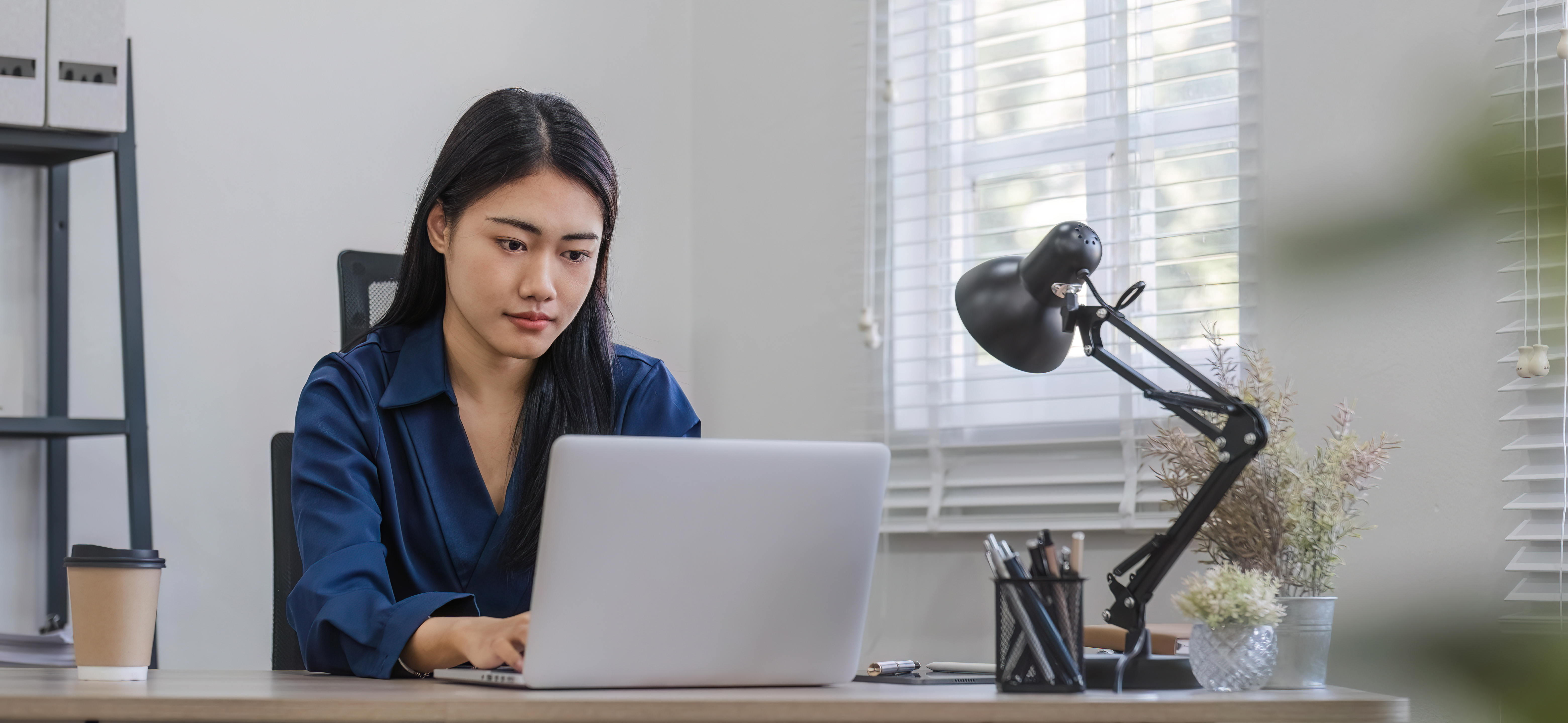 Puzzled confused woman thinking hard concerned about online problem solution looking at laptop screen.