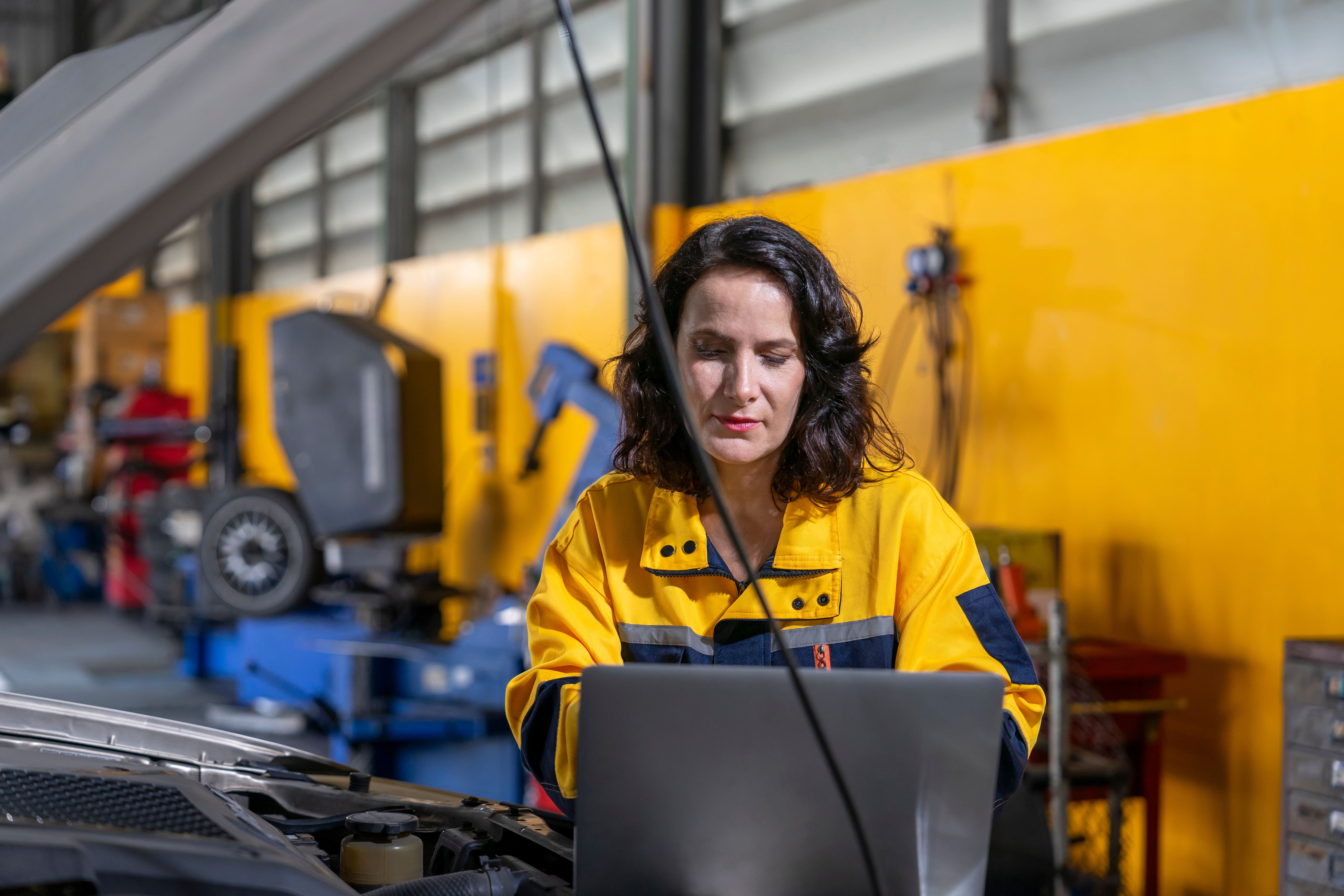 Woman working in an automotive setting