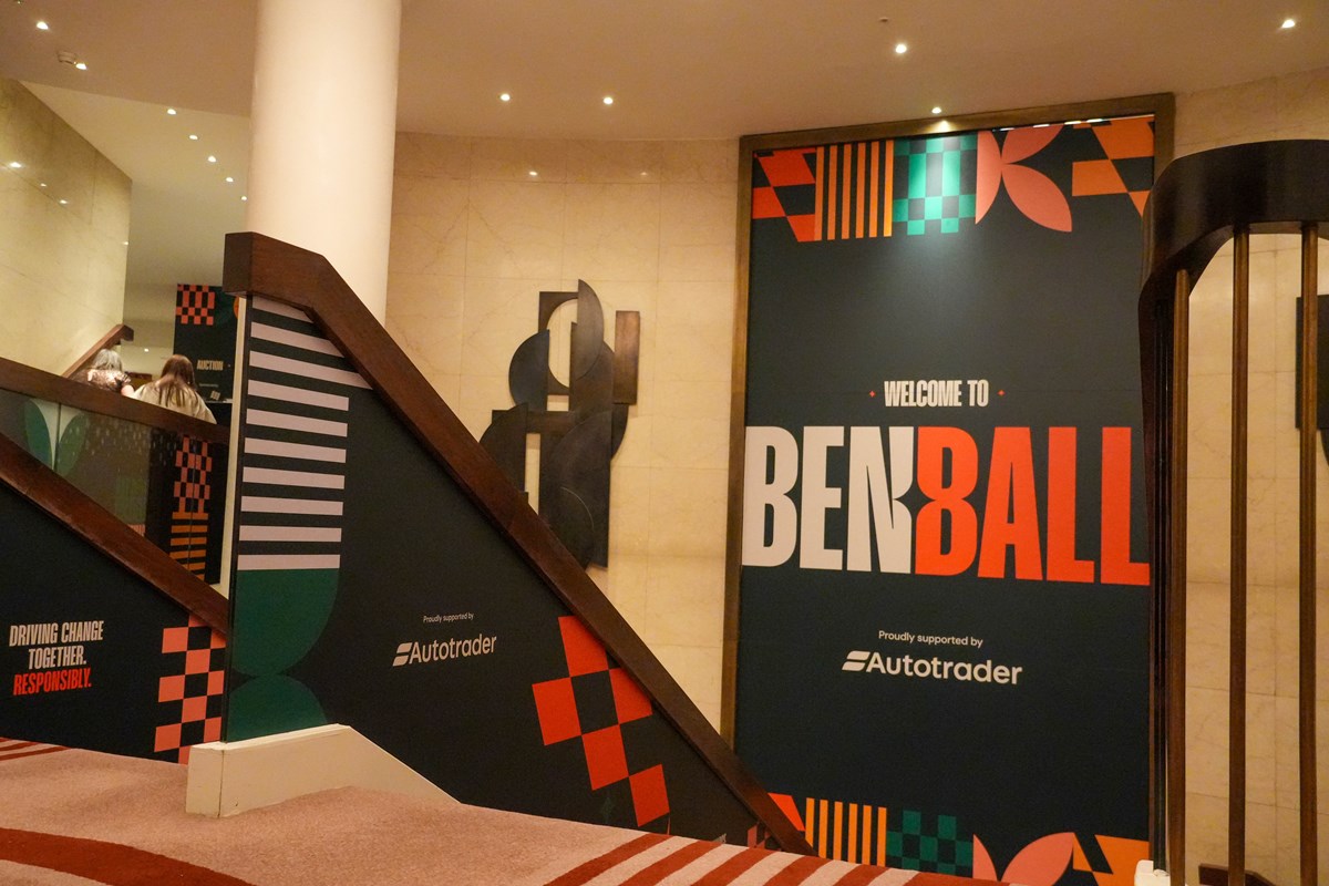 Venue foyer with branded signage reading 'Welcome to Ben Ball, proudly supported by Autotrader' and 'Driving change together. Responsibly.'